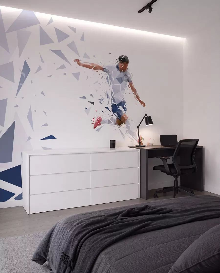 fototapet Fotbalist dinamic într-un stil low-poly, lovind mingea w03289