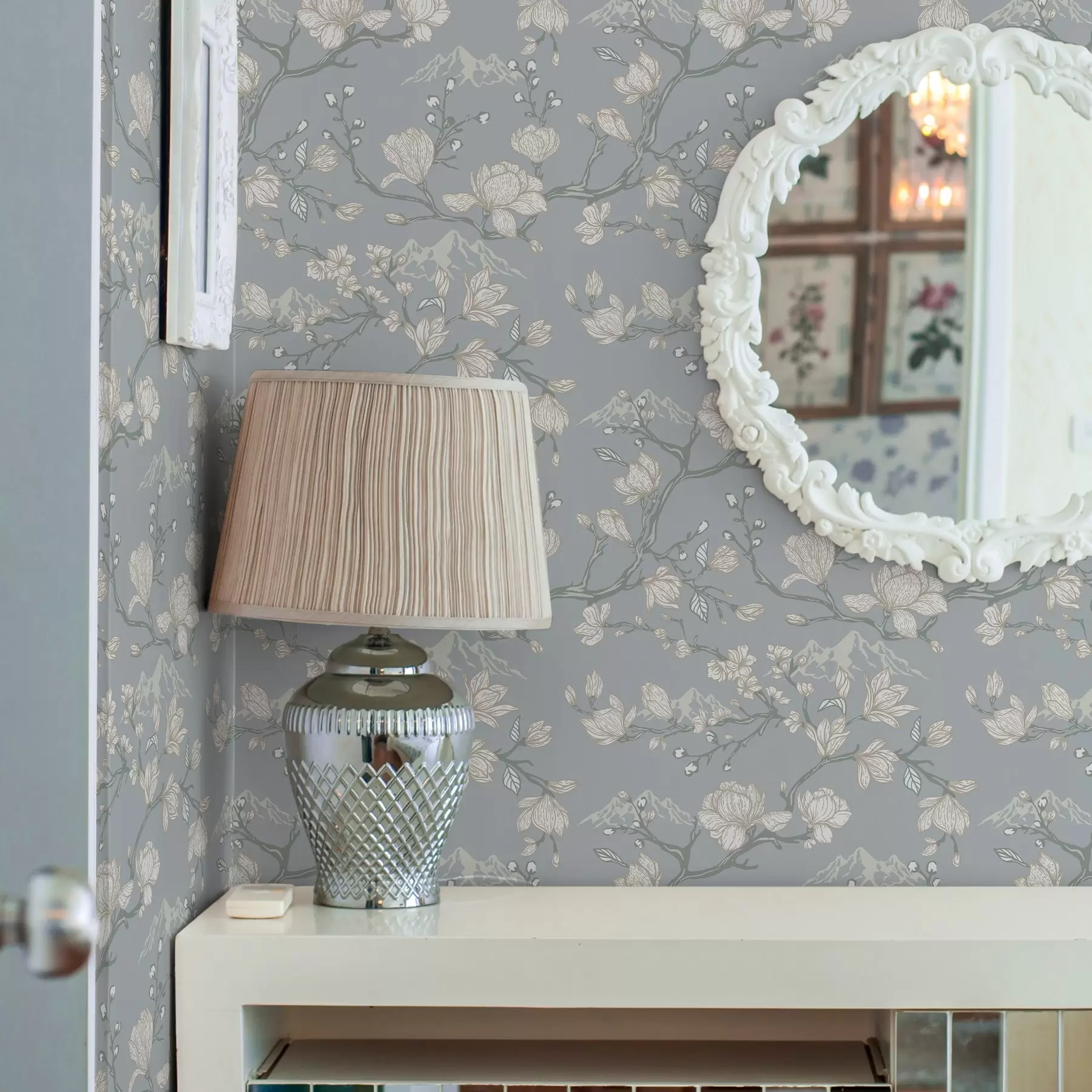 fototapet Flori albe pe ramuri și munți pe un fundal albastru a00021