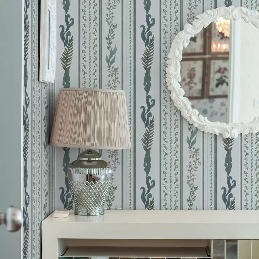 fototapet Dungi cu ramuri și bucle pe albastru deschis rece a00823v1